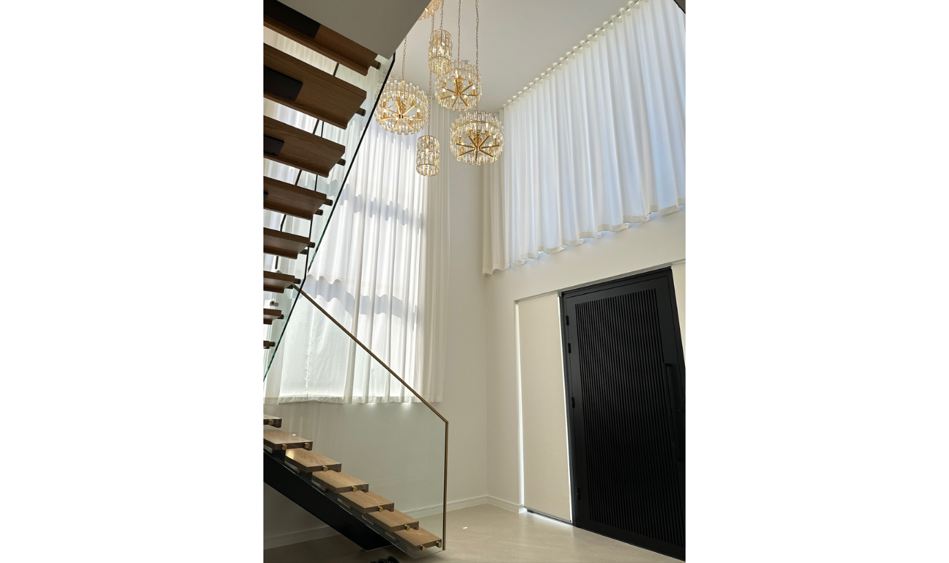 chandelier and stairs inside house 2